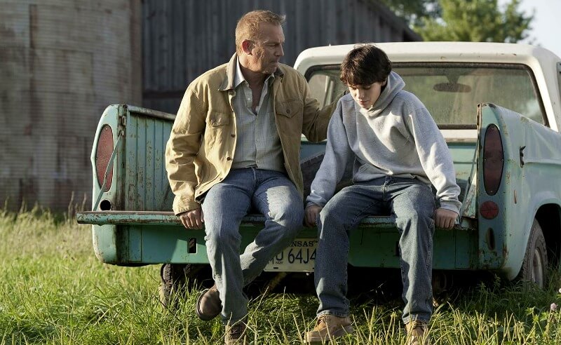 MAN OF STEEL Kevin Costner as Jonathan Kent, Dylan Sprayberry as Clark Kent (Warner Bros.)