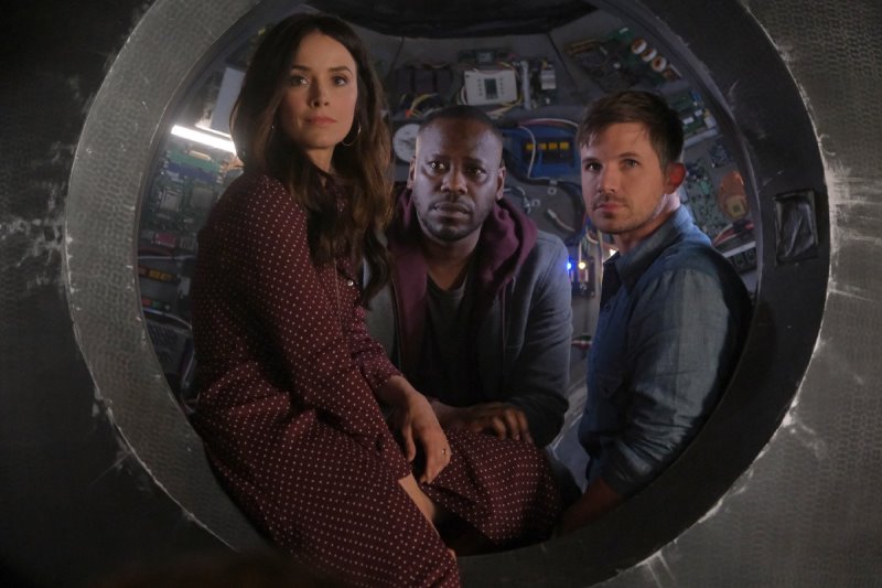 TIMELESS The Miracle of Christmas Part I II 2x11 Malcolm Barrett as Rufus Carlin, Abigail Spencer as Lucy Preston, Matt Lanter as Wyatt Logan (UniversalNBC)